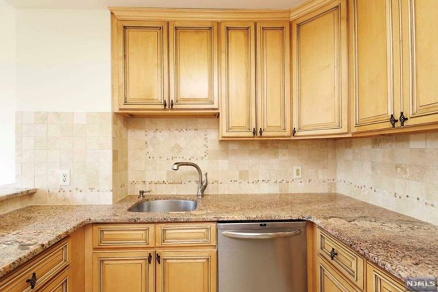 'Carlyle Towers' located prestigious east side of palisade avenue, one of the most desirable building in Cliffside Park. Unit offers approx 1132 SQFT living space, large master suite with en suite master bathroom and walk-in closet, upgrades open kitchen with custom cabinets and granite counter tops/SS appliances, wrap around windows, ample closet spaces and private terrace with NYC view. W/D in the unit. Enjoy white glove services including 24HR Doorman/Concierge, valet parking, outdoor pool, exercise room, onsite management. Close to transportation, school, shopping. Due at lease signing: 1st month rent, 1.5-Month security deposit and 1 Month broker fee. There is $800 application fee, $600 Building Move-in fee, refundable $500 building moving day damage deposit to the building. The landlord will provide one month of complimentary rent at the conclusion of the two-year lease agreement.