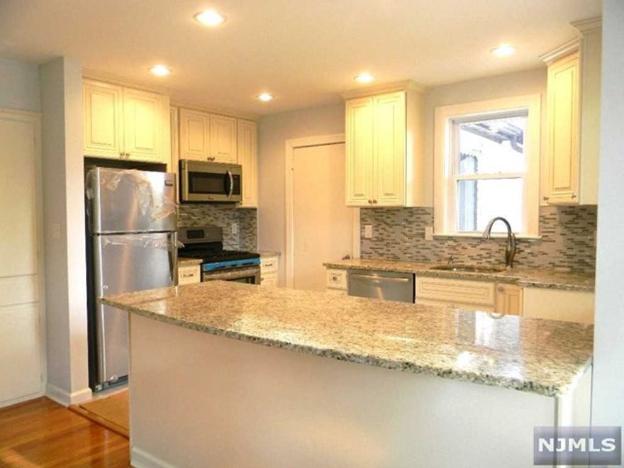 NO STEPS-Newly Updated with Open Floor Plan and totally charming first floor 2BR/1 Bath. Relax & enjoy the Lemonade Porch. Offers Granite Kitchen w/breakfast Bar and & Appliances. DR has built-in Cabinet & Bay Window. LR has decorative FPL (not to be used). Light & Bright with hardwood floors. Primary BR has a WIC, 2nd BR w/2 Closets. Your own W/D are in the basement and generous storage area is above garage. Two tandem designated off Street parking spaces on driveway. Use of side paver patio. House sits on a Cul-de-sac with private porch entrance at Glen Rock Border. Tenant responsible for Utilities, 1/3 water bill. No pets, no smoking in unit. Required are Tenant Insurance, first $150 of each repair. Credit check, Application & proof of income. Once approved an NTN back ground check will be required and finalize with an interview. Tenant pays one month fee. Great place to call home!