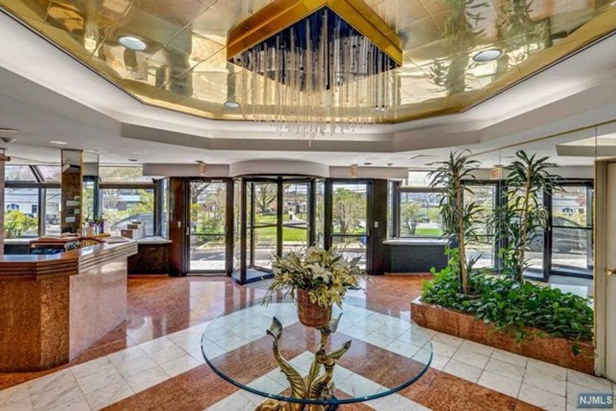 Welcome to this beautiful and spacious 3 bedroom, 2 bath PENTHOUSE in Riverview on the Park with spectacular New York City skyline and river view! You'll love the high ceilings and open layout of the dining/living area with fireplace and alcove - great for home office. Large terrace with fabulous views is perfect for relaxing and entertaining. Bright eat in kitchen with skylight, granite countertops and ceramic tile floor. Lovely master bedroom suite with plenty of closet space and renovated bath with separate shower and tub, double vanity, and marble floor. There are two additional bedrooms, updated full bath and laundry room with full size washer and dryer in unit. Amenities include doorman, exercise room, storage. NYC transportation just outside the front door and close to NY Waterways Edgewater Ferry. Veteran's Park is right across the street and plenty of restaurants and shops nearby. One parking space included, add'l space $50.Must have tenants insurance