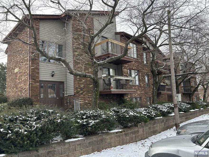 Beautiful spacious well maintained two bedroom, two bath condo in a six unit complex with vaulted ceiling, skylights and gleaming hard wood floors throughout. located near NYC train station and buses. Enter into a large living room with vaulted ceiling which leads to the dining room and kitchen with sliding patio doors to a balcony where you can just relax! Boosts master bedroom with full bath, second nice size bedroom, full main bath, extra closet space, pull down attic for storage, washer and dryer in unit, central air, 1 car garage (right side), shared storage unit near garage, additional parking is available. NO FLOOD ZONE. Don't miss out on the opportunity to own this lovely unit. NOT FHA APPROVED. Small PETS ALLOWED All appliances as is condition, no known issues.