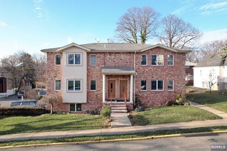 Large and bright 3 bedroom with 3 full baths on one of the most desirable streets in Palisades Park. Spacious living room and newly renovated modern eat-in kitchen. Hardwood floors throughout with ample closet spaces. Laundry is in unit, with one garage, and one parking space included. Fully finished basement, large family room with summer kitchen and one full bath with a separate private entrance. This 3 bedroom is conveniently located just a few blocks away from NYC transportation, highways, restaurants, houses of worship, and shopping. You won't want to miss this one!