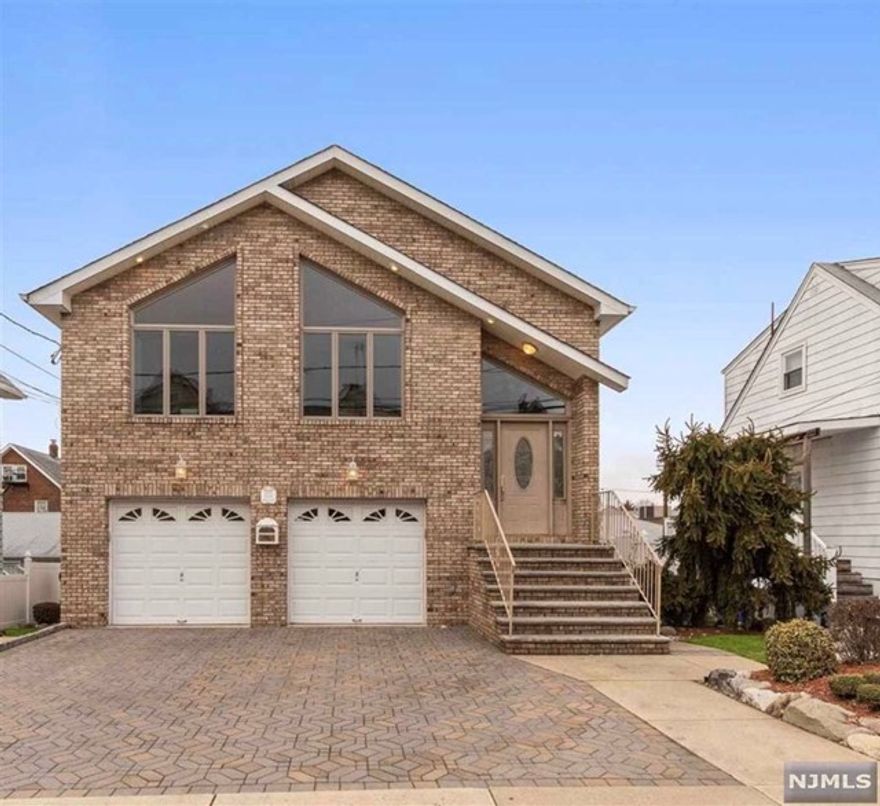 Younger styled Non-Owner Occupied Two Family Home! First floor unit offers two bedrooms,full bathroom, living room, large updated eat-in-kitchen. Gleaming hardwood floors throughout. Washer and dryer. Tenant responsible for snow removal of their side-walkway,steps. No Pets. Close to NYC transportation, train, school and shopping.Backyard will be shared between both tenants.