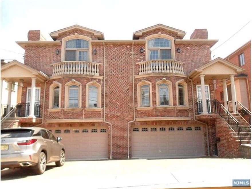 OVERSIZED DUPLEX ON NICE RESIDENTIAL STREET YET CLOSE TO NYC BUS AND SHOPPING. MODERN SOUTH FACING SPACIOUS DUPLEX THAT WAS BUILT BY REPUTABLE BUILDER. HOUSE FEATURES EXTENSIVE USE OF MOLDINGS AND MILWORK.