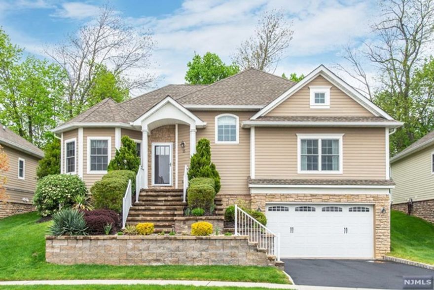 Rare opportunity in sought after Briar Hill 55+ Community. This home offers ranch style living in a complex without connecting walls. This home offers open concept floor plan with designer eat-in kitchen that inc. granite CT, SS appliances & center island. The living room had gas FP & slider to your own private patio. The main bedroom offers a WIC, HWF and full bath w/oversized walk-in shower. The first floor is completed with second bedroom with bath, laundry room, powder room and dining room. The second floor offers oversized loft with powder room and 2 attic spaces for ample storage. The full finished basement offers great rec area, storage area, powder room & garage entrance. There is an elevator that goes from basement to first floor making this the perfect home for 55+