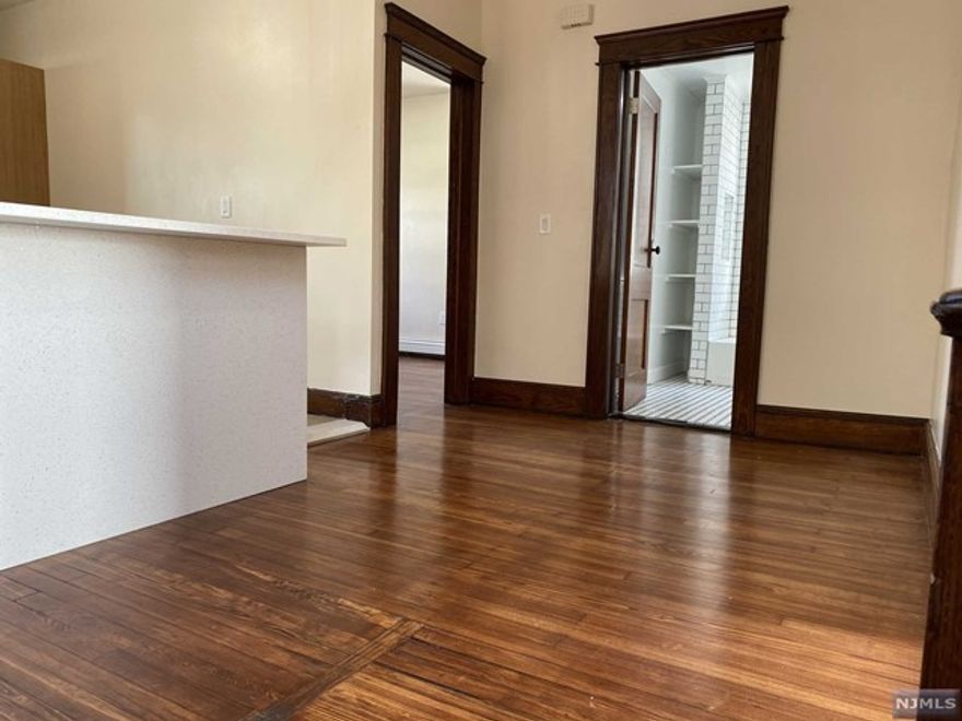 Welcome to this bright second floor just updated with new bathroom and kitchen, with washer/ dryer inside the unit, spacious bedrooms, Refinished hardwood floors throughout and freshly painted, Very close to NYC transportation. Sorry no pets.