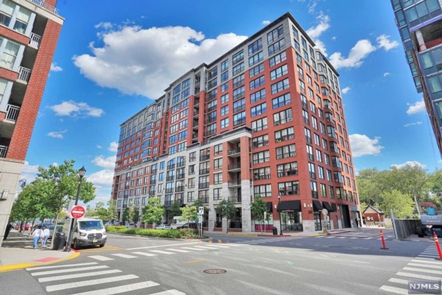 One of Hoboken's greatest waterfront luxury condos. Approximately 1703 SF with Hudson River views. Gourmet eat-in-kitchen with granite counters and stainless steel appliances. Den could be used as third bedroom. Hardwood floors, window treatments and big California closets. dressing room 24 HR concierge, fitness center, pool, children's playground and close to downtown and shopping. Near ferry, bus and free shuttle to PATH and NYC. Owner holds NJ Real Estate License.