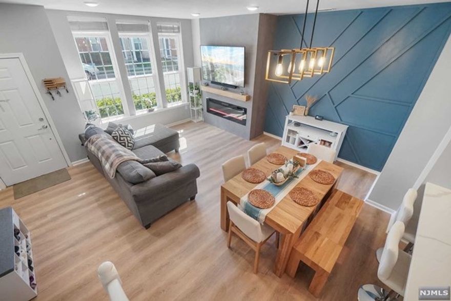 MAY 25th MOVE-IN to this luxury 2 bed 2 bath townhome offering natural sunlight with NJ Transit train station & parks right at your doorstep. The home is awaiting its first tenants. Experience a sleek & chic interior featuring an open floor plan. First floor offers an open concept living-dining-kitchen, full bathroom, energy efficient SS Appliances, White Cabinets with QUARTZ countertops, under cabinet lights, wooden flooring throughout the home, recessed lights & much more. Second floor offers you with in-unit washer/dryer, a luxurious bath with soaking tub, master bed with walk-in built-in closet & 2nd bedroom. Liberty Square at Wesmont Station features athletic sports complex, kids playground, coffee & liquor stores and much more. Bonus Features: Electric Fireplace, Smart thermostat, Ring door bell, Electric charging for EVC, shelving in garage for more storage, fully painted home with modern finishes and much more