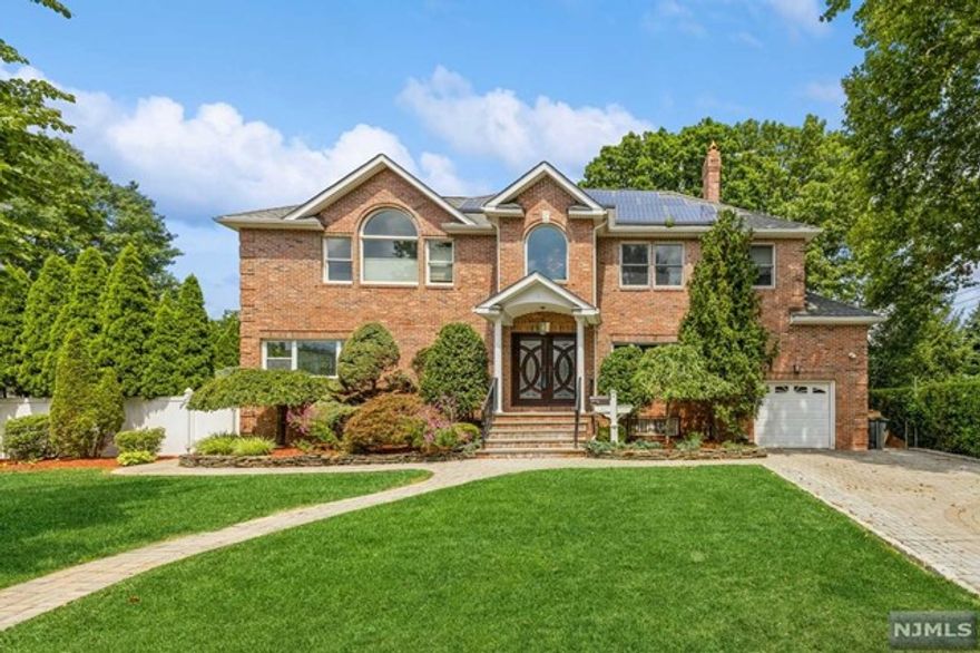 Welcome to your dream home in the heart of Teaneck, New Jersey! This stunning 5-bedroom, 4-bathroom house with central air offers an abundance of space and luxurious amenities, perfect for families or those who love to entertain. This home features a Chef's Kitchen equipped with top-of-the-line appliances, granite countertops, and ample cabinet space, this kitchen is a culinary enthusiast's paradise as well as five generously sized bedrooms, including a master suite and two walk-in closets for comfort and privacy. The finished basement provides a versatile space that can be used as a recreation room, home office, or additional living area. The meticulously landscaped backyard is the perfect place to enjoy your summer days lounging by your private pool listening to the sounds of the waterfall that flows into your koi pond just perfect for relaxation and entertaining.