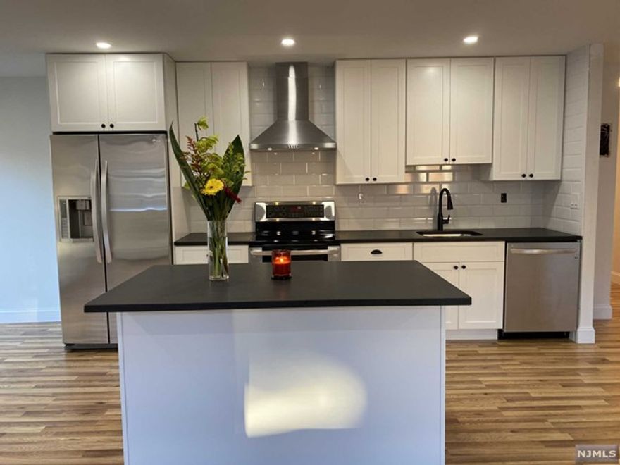 ...BACK ON THE MARKET...BUYER COULD NOT PERFORM. STUNNING CONDO IN THE FAIRMOUNT SECTION OF HACKENSACK. FULLY RENOVATED CONDO OFFERS LRM, DRM WITH SLIDING GD TO BALCONY, EAT IN KITCHEN WITH ISLAND, MBDRM WITH BEUTIFULY DONE MBTH LARGE WALK-IN CLOSET. BDRM WITH LRG CLOSET, MAIN BTH AND TWO EXTRA CLOSETS COMPLETE THIS LOVELY PLACE YOU CAN CALL HOME. MONTHLY MAINTANENCE INCLUDES HEAT, HOT WATER, ONE PARKING SPACE AND A STORAGE BIN ON THE GROUND FLOOR. VERY CLOSE TO NYC BUS, HIGHWAYS, SHOPPING AND SCHOOLS.