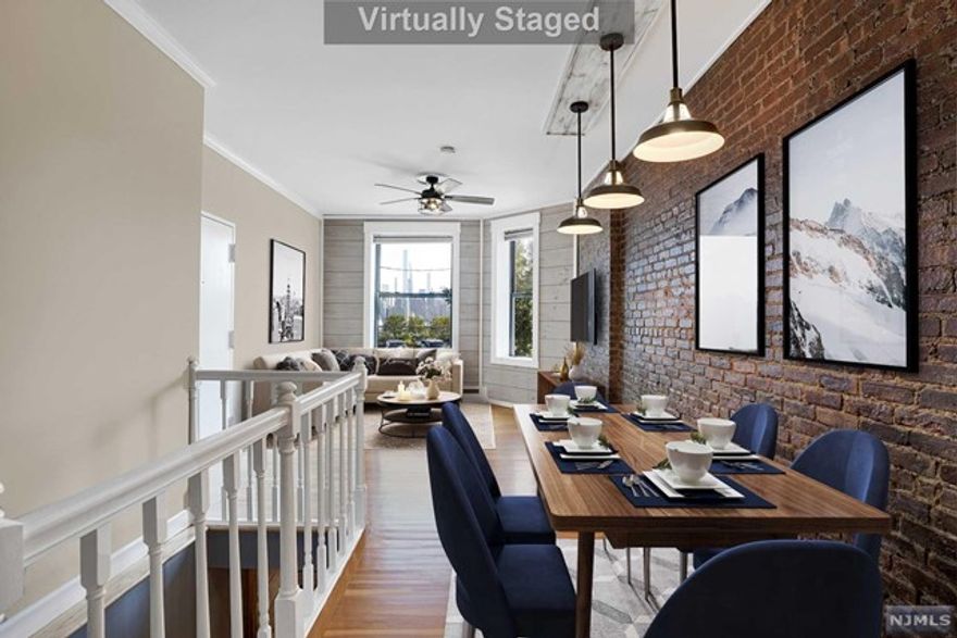 Situated along the breathtaking landscape of the highly sought-after Blvd East locale, you will discover a one-of-a-kind home showcasing the most glorious panoramic views of NYC/Hudson River. Welcome to a beautiful & fully renovated 2BR/2BA Duplex that will sure to please. Upon entry, you will be greeted by an inviting open layout, gleaming h/w floors, spacious living space with large windows to enjoy those NYC views, & a dining area. From there, find a modern kitchen w/SS appliances & smart storage w/extra cabinetry & a cutting board station. Down the hall, enjoy the fully renovated bath & generous size bedroom w/access to the backyard. Making your way downstairs is your own primary suite, w/a modern farmhouse look of sliding barn doors to the bedroom, master closet & a full bath w/ a combination W/D. Additional shared laundry & backyard. The loveliest & unique gem of a residence within the heartbeat of one of the most desired cities, you will want to make this your home today!