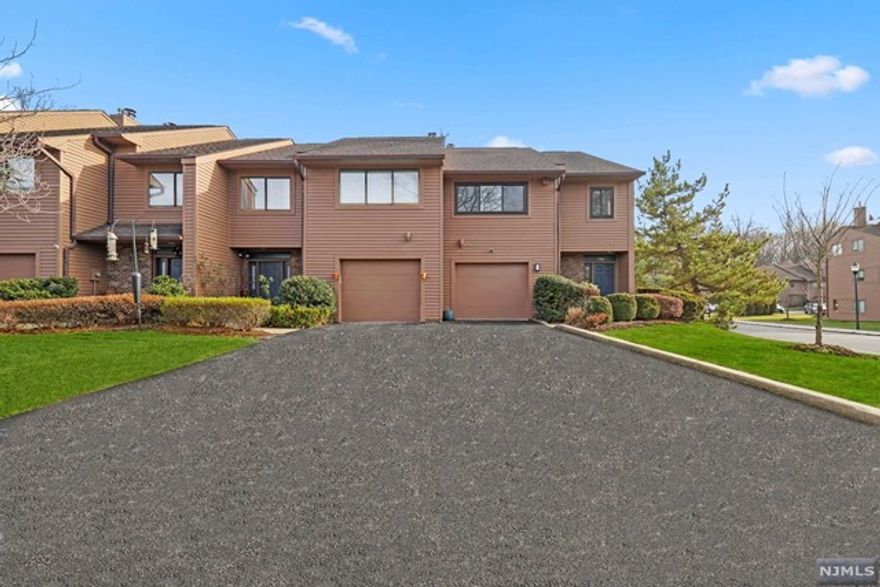 Welcome to this stunning, completely renovated in 2021 end unit in the prestigious Washington Commons! The largest Brookshire model features 3 bedrooms, 2 full baths & 1 half bath. Enter through the entry foyer showcasing the newly installed white oak flooring before heading to the 1st FL. The 1st FL open concept living rm, dining rm & kitchen allows for the perfect space for entertaining! The beautifully renovated kitchen features high-end stainless appliances including Viking stove, Jennair fully paneled fridge, Kitchenaid dishwasher & Sharp built-in microwave.2nd FL is complete with 2 bedrooms, full bath & laundry.3rd FL allows for a private Primary Suite retreat including fully renovated Primary Bathrm & custom fitted walk-in closet.The ground FL Family rm completes this home with tile flooring, 1/2 bath & walk-out access to an over-sized private patio. Community swimming pool, tennis courts, club house & manicured lawns surrounded by nature. This townhome is not to be missed.