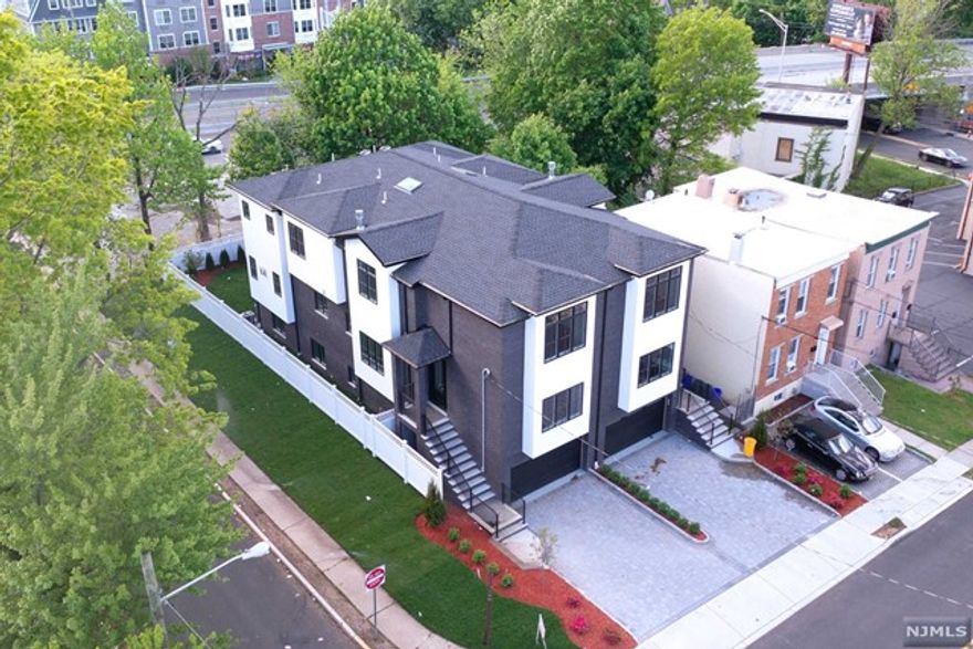 Proudly present elegant design and modern conveniences over sized 3422 SF brand new side by side duplex.Features modern style lighting and electric system such as digital & finger printing recognize electric door, smart phone controlled lighting & garage door open system computerized refrigerator & hood system. Gracious open floor plan, abundant closet space such as shoe rack and coat room closet at garage entrance foyer area. The kitchen is outfitted with custom cabinetry and high end stainless still appliances with wine cooler, center island, pantry room. Master bedroom with walk in closet, master bathroom has dressing table. All first floor and all bathroom has radiant heated system. Gleaming hardwood flooring with 1/2" high thickness supporting stand glass of handrail, video surveillance & security system, central vac and sprinkler system. Spray form insulation and reinforced steel poured concrete foundation. Close to school and NYC bus stop. A must see hurry up!!!