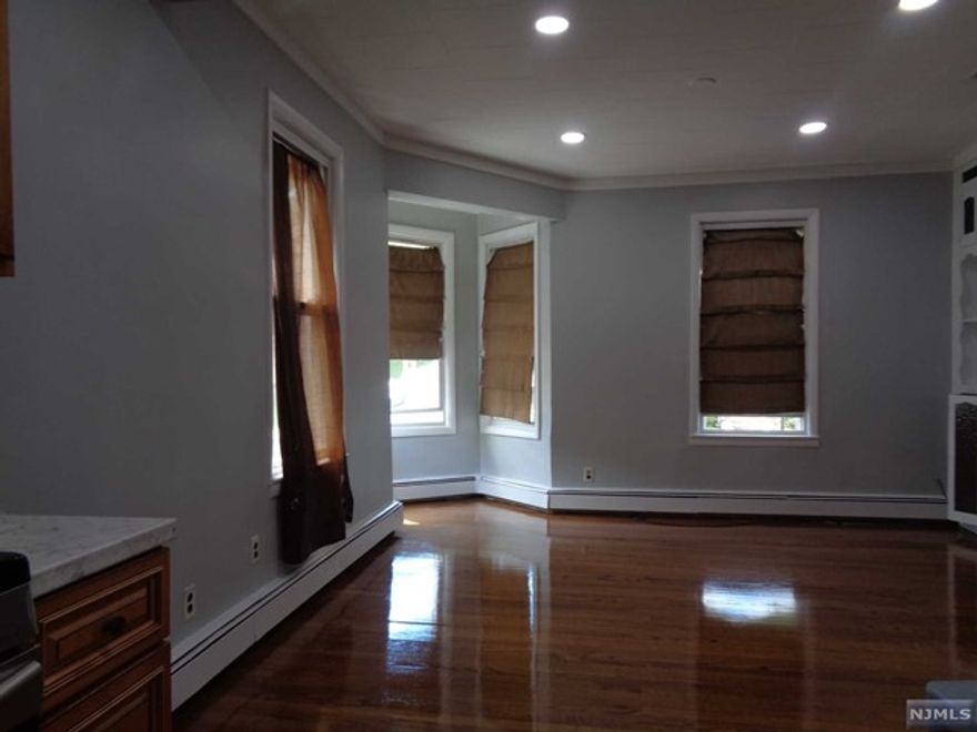 Recently Renovated & spacious 2nd floor unit with unique layout,(2nd & 3rd level combo)offering:Living Room,Dining Area, Modern kitchen with new stainless steel appliances, Pantry/Closet, 3 rd level offer:2 Bedrooms with closets,full Bath, Den/Family room, C/A,gleaming hardwood floors,Convenient location, nearby schools, parks,NYC Transportation & easy access to major highways.Credit & Background check is required ( NTN Screening)1 Month Security, 1 Month Realtor Fee, 1 Month Rent. Available for IMMEDIATE OCCUPANCY.