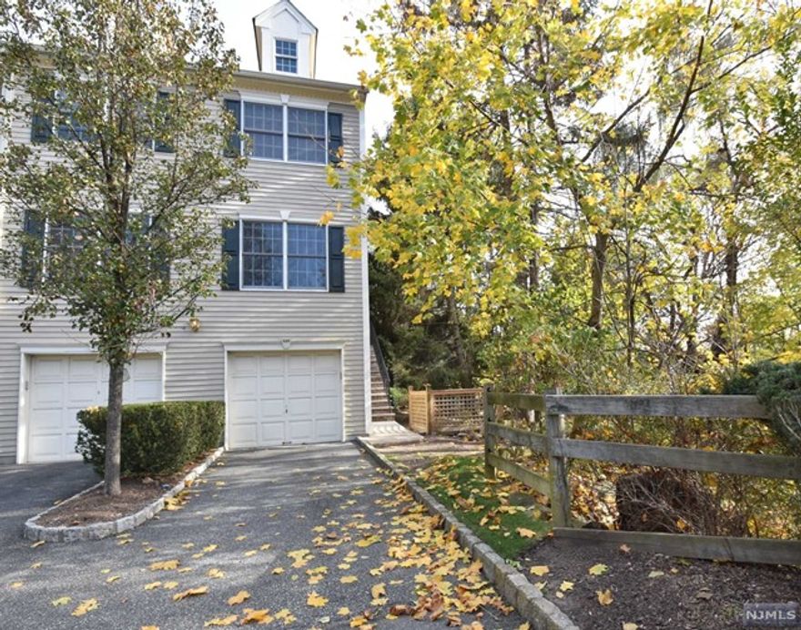 Available Immediately! Beautiful Cambridge Heights gated community! The Williamsburg section of Cambridge Heights end unit ! Featuring 2 bedrooms, 2 full baths and w/walk-out lower level. Wood burning fireplace in living room w/terrace and newer wood floors, attached garage. No amenities included.