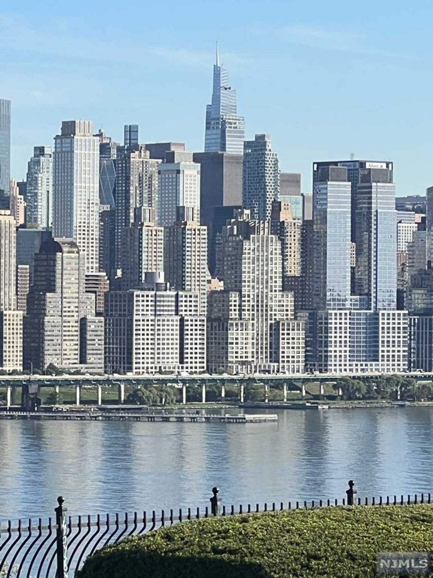 Large 2 rooms, separate one bedroom in this wonderful, elevator building located right on Blvd East. There are two rooms but living room is together with the small kitchen. Great location!!!! Nice clean building with laundry room. NYC transportation in front of the building. 2 EXPRESS BUS STOPS TO NYC. Close to shopping , close to restaurants and parks. This building is facing NYC. Laundry room at 1st floor. Also bicycle room. Easy street parking in front of the building. Side of the building is a wonderful community garden. Per management request the unit has carpet now in top of the wooden floor. But it can be changed.