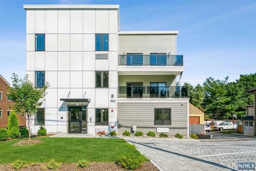 BRAND NEW boutique 6 unit apartment building in prime Teaneck location! Gorgeous two bedroom, 2 bath, 2 balcony unit featuring the modern design and amenities. Beautifully landscaped with secure lobby, elevator, covered parking and close to houses of worship. Unit has open floor plan, intercom, central AC/heat, washer/dryer and a balcony. Act fast! Last available unit, won't last long!!