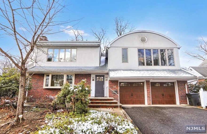 Situated in the reputable East Hill neighborhood of Demarest, a spacious 4 bedroom colonial with notable UPGRADES; BRAND NEW (open) kitchen, NEW (hardwood) floor, partially UPDATED bathrooms and lighting and brand new built-in water purifier. Master bedroom has a cathedral ceiling, marble bathroom, built-in cabinets and updated basement (to use as a recreational room, gym, and/or family entertainment) Prestigious Blue Ribbon high school & easy commute to NYC (minutes from 9W) Yard Maintenance by Landlord.