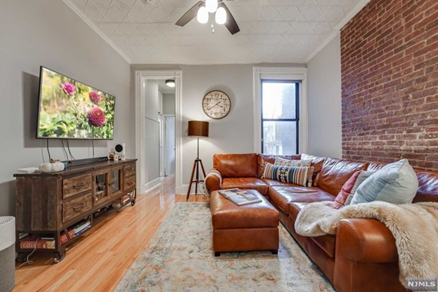 Location location location! This two-bedroom, one bath condo is perfectly located in Hoboken's most desirable NE corner of town. This unit has everything you need, from exposed brick to high ceilings and tons of light/large windows. With a bright and open concept kitchen & dining space that boasts stainless steel appliances, tons of cabinet space, and an oversized entertainer's living room. Newly renovated bathroom, custom closets throughout, additional storage in basement, and a large shared backyard. This unit is on one of Hoboken's few brownstone lined neighborhood blocks, Willow Ave. Just across the street from Bus transportation to NYC, and blocks from everything this city has to offer with parks, restaurants, bars, shopping, grocery, and PATH. Don't miss out, schedule your private tour today!