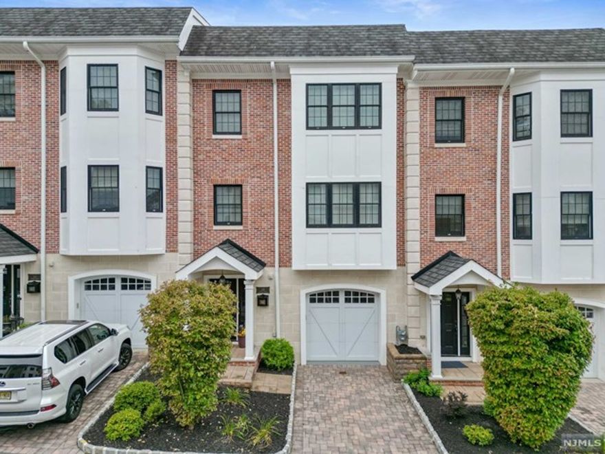 Welcome to The Brownstones at Caldwell! This 4-story unit boasts over 2,000 square feet of living space! Featuring 3 bedrooms, 2 full bathrooms, and 2 half bathrooms, PLUS a fully finished ground level! This brownstone townhome was built with pride and care, with true quality craftsmanship. This incredible unit is an entertainer's delight, with TWO outdoor spaces - a patio off of the ground level and a Trex deck right off of the open-concept kitchen! Walking distance to over 100 amazing restaurants, come find out what luxury living is like in The Caldwells!