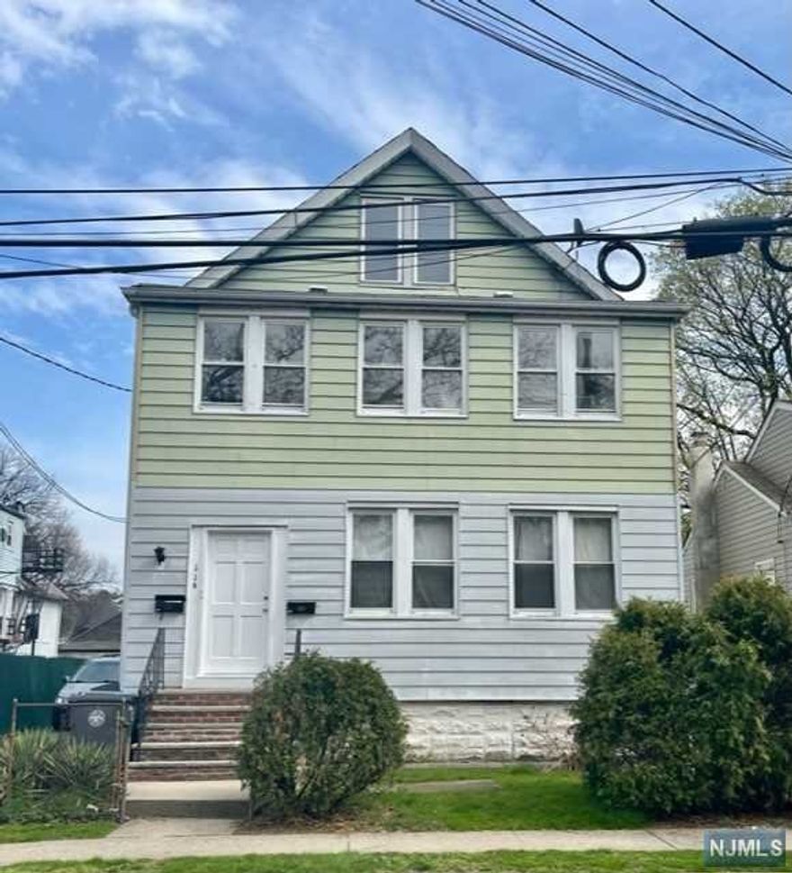 Must see! An extra large 4 bedroom apartment in this beautiful and well kept 2 family house. 3 bedrooms on the main floor and one bedroom on its second floor, that includes an enclosed porch. Brand new refrigerator, washer & dryer. Two non-garage parking spaces.