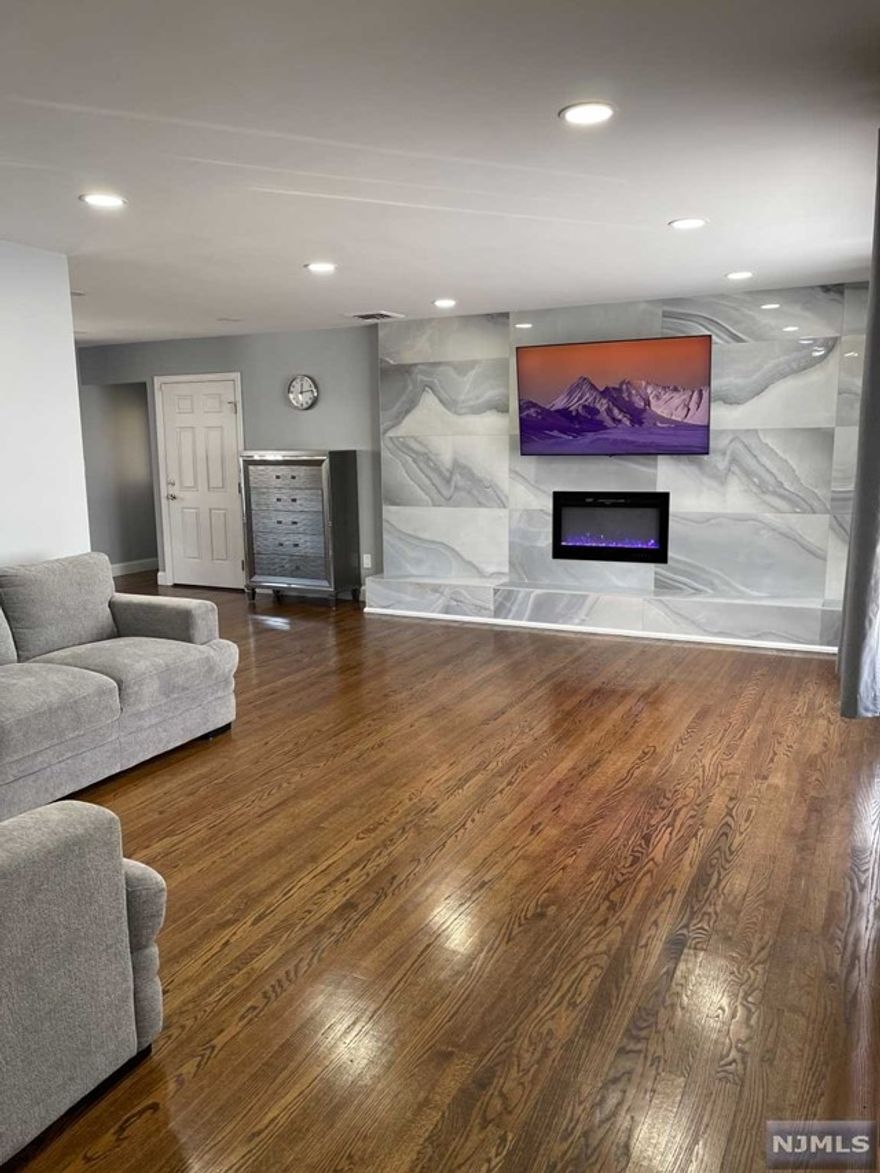 Welcome Home! Beautiful custom brick ranch. Features Large Living Room with Fire Place, Formal Dining Room, Hardwood Floors, Central AC, All appliances new, Renovated bathrooms, Smart TV's in every room. Google Nest Installed, Electrical bed with massage, Oversized two car garage. Access from the Kitchen to the garage, yard. Finished basement with laundry & storage , Rear patio, Property with amazing yard, Front porch, Elementary school right across the street. House rented fully furnished.