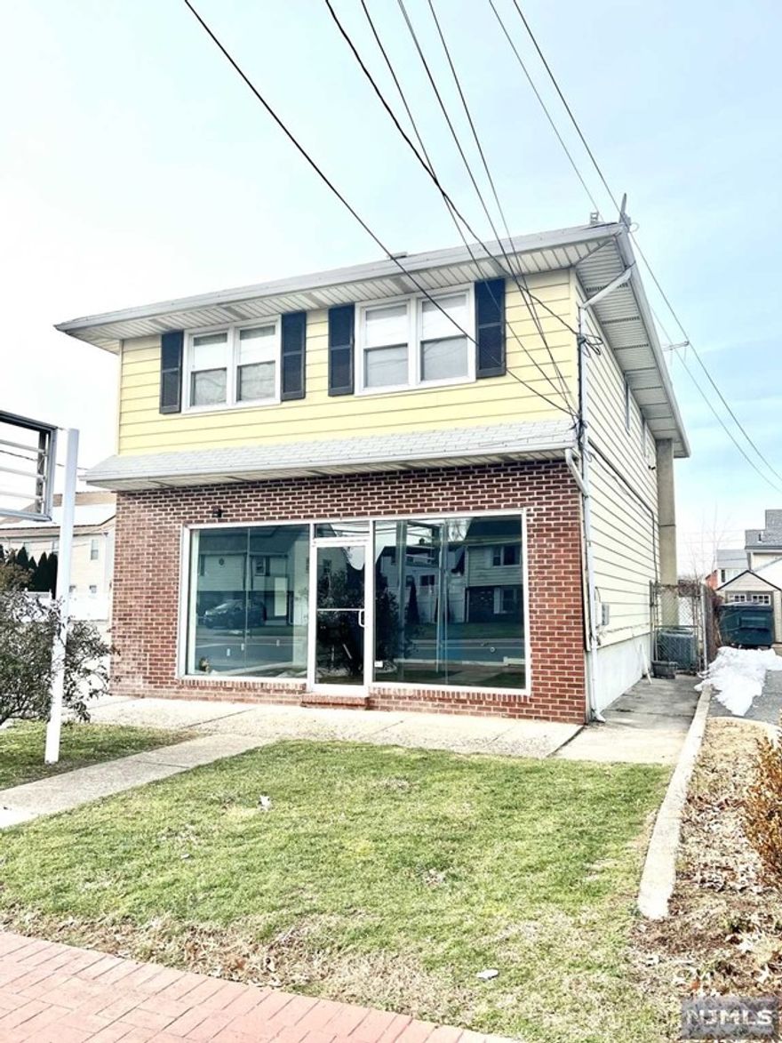 Highly visible, well maintained investment property in the center of a very desirable town. First floor was occupied by a beauty salon. Second floor offers 2/3 bedrooms, living room, eat in kitchen, two full bathrooms. Second floor is occupied by a long-term tenant. Rent is under current market value at $1450.00. Easy access to NYC, public transportation, restaurants and shops.