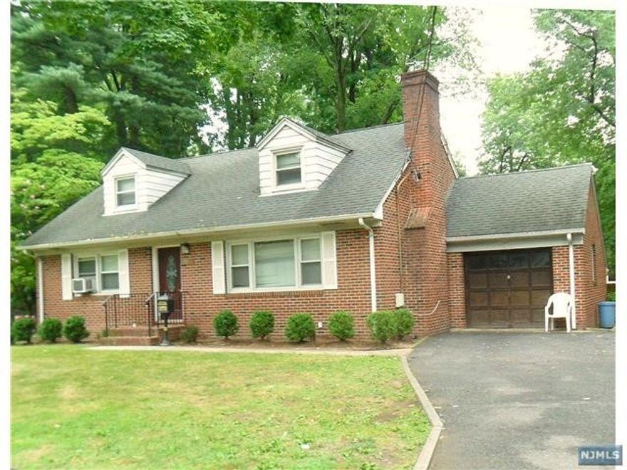 CHARMING 4 BEDROOM HOME...ONE AND A HALF BLOCK FROM THE BLUE RIBBON, NORTHERN VALLEY HIGH SCHOOL RATED # 1 IN NJ ...JUST STEPS TO NYC BUS...APPROXIMATELY 9 MILES TO GEORGE WASHINGTON BRIDGE...THIS HOME FEATURES A DRIVEWAY WITH PARKING FOR FOUR CARS...FOUR GENEROUS SIZE BEDROOMS...BEATIFULL HARDWOOD FLOORS THROUGHOU...TWO NEW FULL BATHS...A LARGE COUNTRY KITCHEN...LIVING ROOM WITH FIREPLACE...FRESHLY PAINTED...A FULL BASEMENT WITH SEPERATE ENTRANCE ODDICE, WASHER/DRYER AND STORAGE...OPPORTUNITY KNOCKS A CHANCE TO LIVE IN THIS AFFLUENT TOWN THAT HAS A UNIQUE NATURE CENTER,FANTASTIC SWIM CLUB, BALL FIELDS, TROUT FISHING,TENNIS COURTS,ICE SKATING AND SO MUCH.