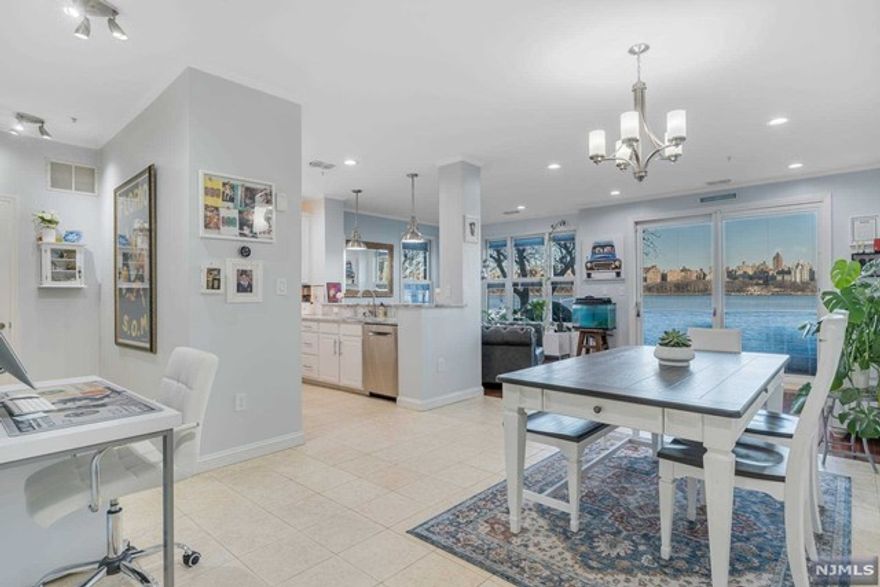 Discover pure luxury in this EXTREMELY RARE, corner unit, with DIRECT EAST & NORTH VIEWS of NYC and the Hudson River! This impeccable 2 bed 2.5 bath, Bergen style, townhouse is located in the highly sought after Jacobs & Bulls Ferry! Spanning across 1444sqft of gleaming wood flooring throughout & NYC/Hudson River views through every window. Chef's kitchen w/SS appliances, quartz countertops, a breakfast bar, & plenty of cabinet space open to the main living/dining area. Step outside on to your private patio for your entertainment ease! Up to the second floor to the large primary ensuite featuring a customized walk-in closet; ensuite modern bathroom w/double vanities & a large walk-in shower & a balcony with direct NYC/River views. Generous size second bedroom w/full bath & extra storage in the hall. Enjoy the fully customized laundry room & parking for two cars. Community offers 24 hour security, shuttle to/from Ferry & Lightrail, 2 outdoor swimming pools w/Jacuzzi, and more!