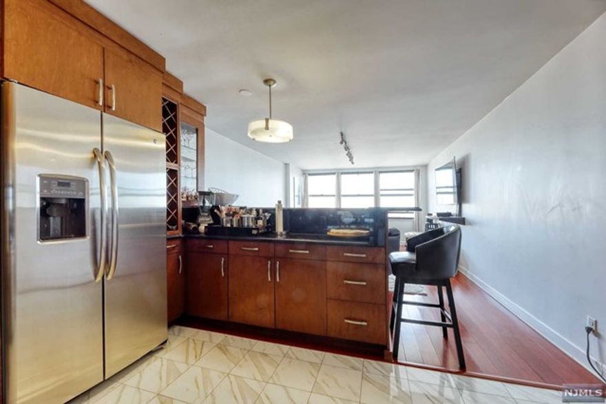 On the 45th floor, See the Empire State building and the George Washington Bridge from this Two Bedroom two Bath Condominium at Galaxy Towers on Blvd East in a Luxury Hi -rise has a spectacular river view and Manhattan skyline view from every room. Great layout Large Entry Foyer, living room with wood floors, Dining Area,Open, Modern eat in kitchen with granite countertops and stainless-steel appliances. Two Bedrooms with great closets and two full modern Baths. The building features 24-hour door person, gym, tennis courts, Indoor and outdoor swimming pool. shops on premises. pets welcomed. Indoor parking available. public transportation in front of the building.20 minutes to midtown Manhattan.