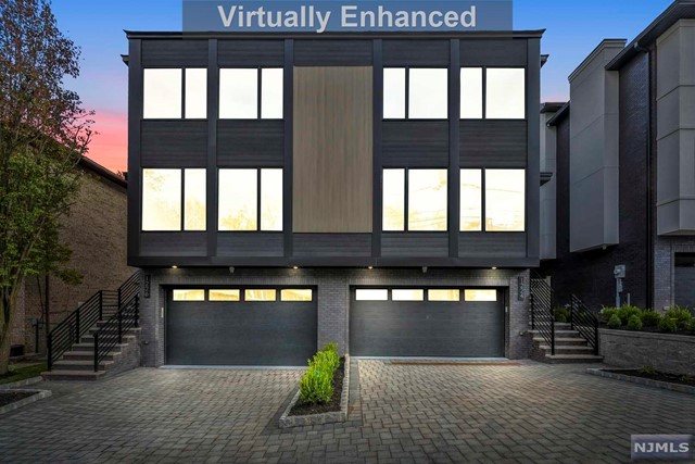 Beautiful Brand New Construction Duplex Home Located on Oversized Lot. Property Features 3 Bedrooms, 2 Full Bathrooms, and 2 Half Bathrooms. Open and Chic Floor Plans, Exquisite Finishes and Spa Like Bathrooms. Smart Home Enabled- Lutron Light Switches, Electric Doorknobs and Other Features. All Bathrooms, and Ground Level Features Radiant Floor Heating. Spray foamed insulation throughout. Main Level Features Extended Waterfall Island with High End Appliances, Living Room w/ Built in Speakers, Dining Room, Family Room, Dedicated Pantry Room, Deck and Powder Room. Top Floor includes Master Bedroom w/ Generous Closet Spaces, Luxurious Bathroom w/ Dual Vanities, Huge Tub, linen closet and Skylight. Two Additional Bedrooms, Full Bathroom, Skylight and Washer+ Dryer. Ground Level Features Large Rec Room, Mudroom, Garage Entry, Storage Space, Half Bathroom and Backyard. Close Distance to HMart, NJTransit, School 4 and Fairway Market. Not A Detail To Be Missed- Check It Out