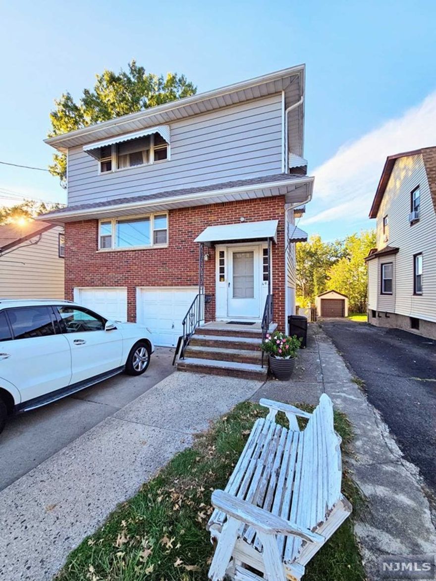 Commuters dream, 10 mins walk to Train Station to Manhattan, Bus stop cross the street, updated 2 bedrooms, Modern Kitchen, Dinning Room/ living room combo, Included washer/dryer in the basement. Owner holds R.E. License.