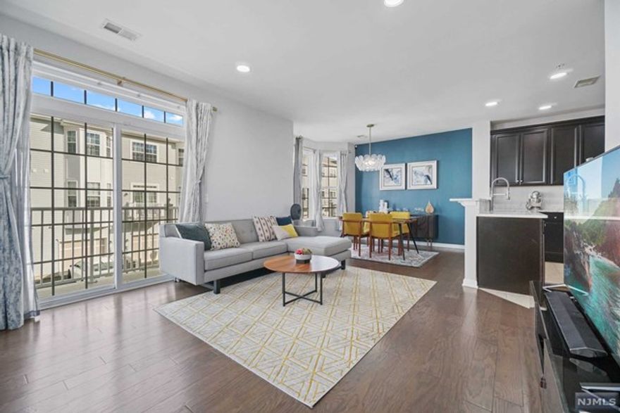 Call 7327890670 for touring. Experience a convenient lifestyle at one of the most sought after communities in Bergen county. Step into your beautiful END UNIT townhme w/ over 2000 sq ft to experience a bright & spacious interior featuring open floor plan. The home is tastefully upgraded on all levels featuring 3 generous size bedrms, 2.5 baths with 2 car parking. 2nd floor features open modern kitchen, dining area with BAY WINDOWS, powder bath, a sun-filled living rm w/ PATIO. Kitchen offers all SS appliances, Quartz countertop, raised bartop, pantry. Master bedrm offers high-cathedral ceilings, HIS & HER Built-in closets. Master bath offers dual vanity & standing shower, soaking tub. Spacious 2nd & 3rd bedrms w/ office space outside the bedrm for your WFH needs. Enjoy Luxury Of PARK W/ sports fields Right At Your Doorstep. Conveniently Located From NJ Transit Train & Bus Stops. Bonus Features: Smart lock & ring doorbell, finished garage w/ shelving, Refri & WD w/ warranty & much