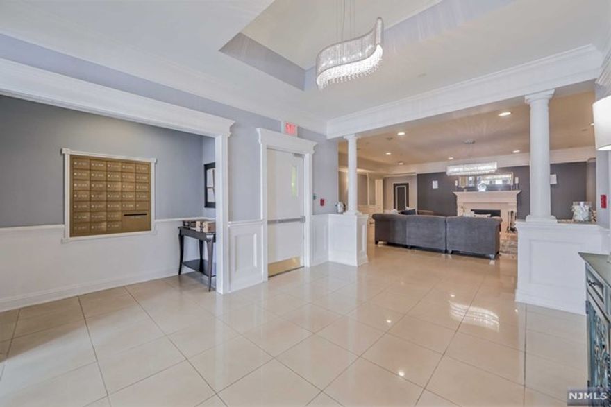 Welcome to easy living in this vibrant 55-plus community. This one-floor condo offers an open floor plan that makes for effortless entertaining and comfortable living. The grand entrance lobby warmly welcomes you and your guests, and an elevator provides easy access to your level. Inside, you'll find an open dining room and living room complete with a cozy gas fireplace and a walkout to a private terrace. The oversized master bedroom features a large walk-in closet and a private full bathroom equipped with a walk-in stall shower, a relaxing soaking tub, and a double vanity. A second full-size bedroom and a second full bathroom provide ample space for guests or additional household members. The eat-in kitchen boasts plenty of granite countertops, a granite breakfast bar for convenient dining, stainless steel appliances, and a separate dining area. A laundry room is conveniently located within the unit, and an assigned storage room on the same level provides easy access.