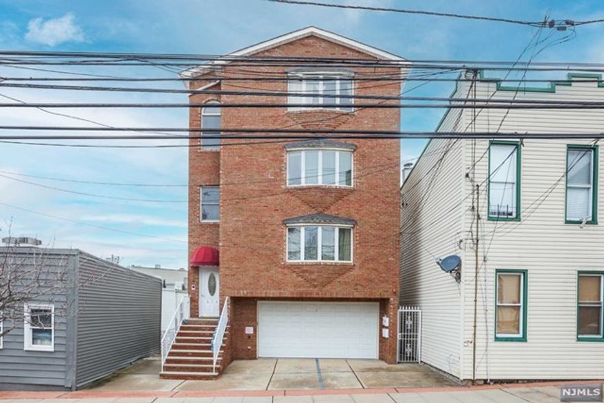 Welcome to this sensational pride of ownership with a spectacular view facing NYC! This 2005 meticulously kept spacious condo features 3 bedrooms, 2 baths, gorgeous kitchen with stainless steel appliances and beautiful hardwood flooring with modern recessed lighting. Spacious master bedroom includes private full bath and walk-in closet. Other highlights: One assigned tandem parking space in garage with remote control door, washer and dryer in-unit, and central air. Nothing left to do here but move-in and make yourself the new proud owner! Truly a walker's paradise, with public transit easily accessed. Condo is in a prime location minutes from stores, schools, and restaurants. Union City is a Great location for NYC commuters, be in NYC within minutes.