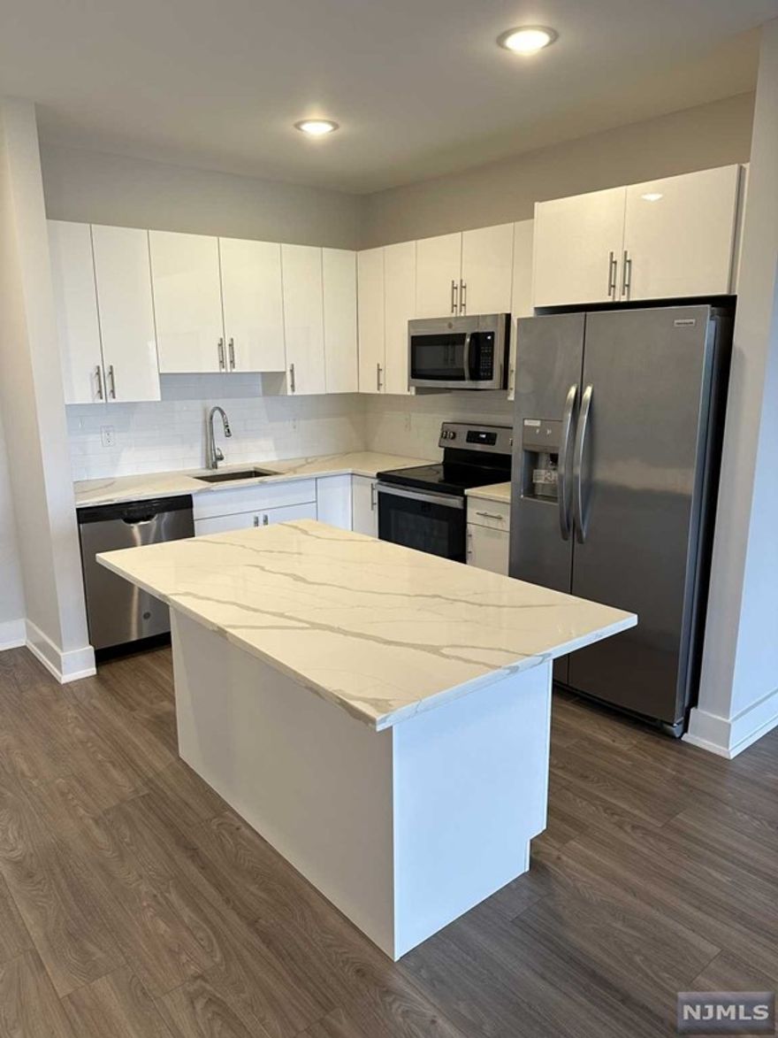 1 parking space INCLUDED, and REDUCED security to qualified applicants - Welcome to The Addison - Fort Lee's new luxury rental building offering a variety of upscale, spacious floorplans. The Addison offers high-end residences fully equipped w/ modern kitchens w/ stainless steel appliances, quartz countertops, full islands & tiled backsplashes, open living/dining areas, shades on all windows, modern bathrooms & a full-sized washer & dryer in each unit. Exclusive 24/7 virtual doorman service for communications, package deliveries & access control via video intercom system linked to your smart phone. The Addison includes a large on-site fitness center including virtual touchscreen workout mirror, electric car charging stations & parking garage w/ direct elevator access to all residences for uncompromising security. Pet friendly ! (LB limit & fees apply) Tenants pay utilities. All amenities & one garage parking space is included.