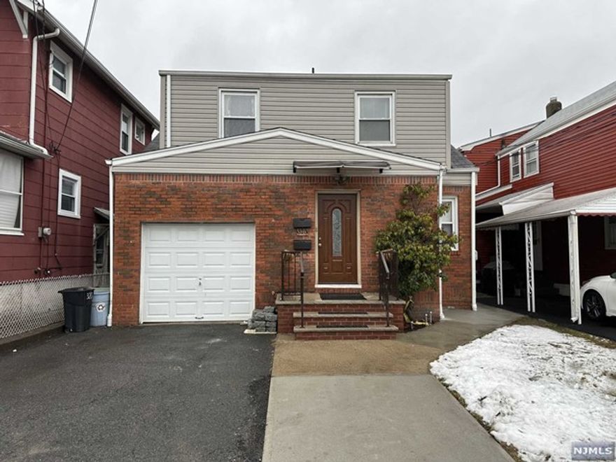 Welcome to this over-sized first floor apartment. It includes 3 bedrooms, eat-in modern & renovated kitchen, 2 full renovated baths, washer and dryer, and a full sized finished basement with an enormous amount of space and extra rooms! There is also parking on the driveway and shared use of the yard. No pets. All interested tenants must complete credit, application, and back-round check. Prime location for transportation, parks, schools, and shopping.