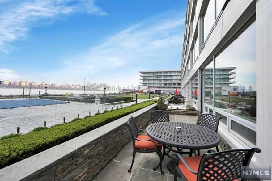 MAGNIFICENT TWO UNITS COMBINED WITH DIRECT BREATHTAKING VIEWS OF THE HUDSON RIVER AND NYC! THIS ONE OF A KIND 2400 SQ FT UNIT WILL WOW YOU FROM THE MINUTE YOU WALK IN. LARGE OPEN FLOOR PLAN FEATURES STUNNING MODERN KITCHEN WITH OVER-SIZED CENTER ISLAND, WOLF AND SUBZERO APPLIANCES, FLOOR TO CEILING WINDOWS, 10-12 FT CEILINGS, AND HARDWOOD FLOORS THROUGHOUT. HUGE FORMAL DINING ROOM OPEN TO FAMILY ROOM IS PERFECT FOR ENTERTAINING. YOUR OWN PRIVATE, RARE 8X49 FT HUGE PATIO AREA OVERLOOKING NYC WITH PLENTY OF ROOM FOR TABLE, SITTING AREA AND GRILL. AUTOMATIC BLINDS SYSTEM, 2 CAR GARAGE PARKING, 2 EXTRA STORAGE UNITS, 2 SETS OF WASHERS/DRYERS AND SO MUCH MORE TO SEE! BUILDING AMENITIES INCLUDE POOL OVERLOOKING THE NYC SKYLINE, STUNNING ROOFTOP DECK/BBQ GRILL, PRIVATE ROOFTOP RM, PRIVATE PIER, 24HR DOORMAN, & GYM!