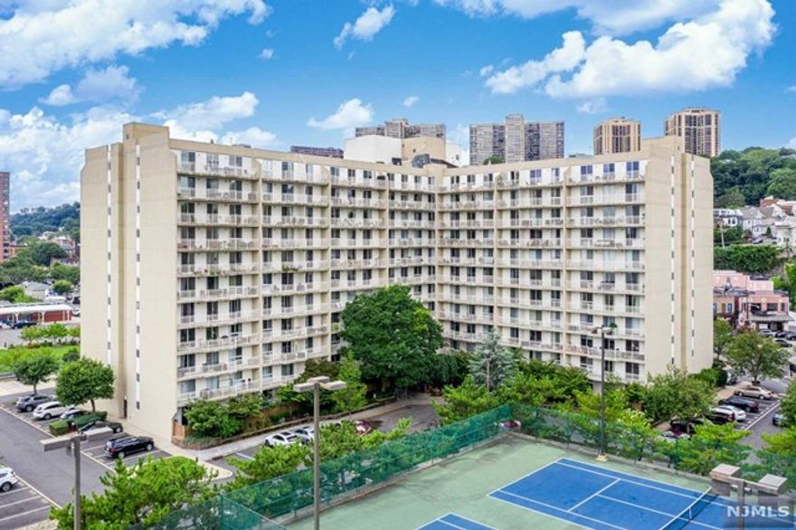 Welcome to Admiral's Walk, a 24-hour gated community. This riverfront residence offers fantastic amenities, including 2 tennis courts, basketball courts, a sauna, a gym, and a heated pool, along with a pavilion for special events. The unit boasts an updated kitchen with new appliances and a large terrace showcasing an Eastern sunrise as well as a panoramic Hudson River view. It features spacious 2 bedrooms, 2 luxurious bathrooms, and built-in walk-in closets. Enjoy an easy commute to the city with ferries and buses from the marina conveniently located next door. Additionally, there is a close shopping center for your convenience.