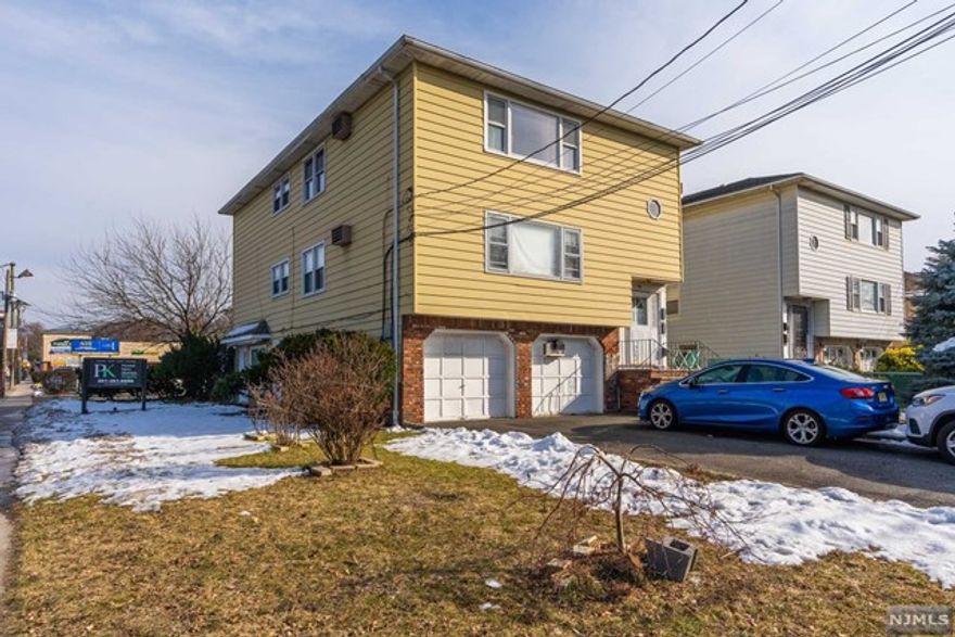 This stunning mixed-use property boasts a prime location and versatile layout, offering the perfect blend of residential comfort and commercial potential. Nestled in the heart of Elmwood Park, this property features two spacious floors, each with three inviting bedrooms. With a total of six bedrooms across two floors, there's ample space to capitalize on rental opportunities.