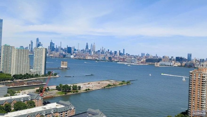 Immerse yourself in the luxurious lifestyle that A Condos has with this large one bedroom that offers spectacular panoramic NYC views from every room which combines the best of comfort, convenience, and style. This exceptional condo boasts hardwood floors throughout, the kitchen has SS appliances, granite countertops with breakfast bar, in unit washer/dryer and a deeded parking spot in the building. Amenities include a full time concierge, fitness center, outdoor sunning decks, BBQ Grills, children's playroom and a residence lounge with deck. Located blocks from the waterfront, shopping, restaurants, transportation and parks that is truly the perfect gateway to premier downtown living.