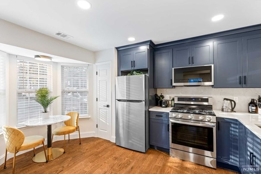 Absolutely Mint Condition - FULLY FURNISHED, and Luxury Renovated Glenn's Grenville condo. Sun-Filled END UNIT, two bedroom, 2 1/2 bath, Featuring Brand New Hardwood Flooring, Brand New Eat-In kitchen, with Brand New Stainless Steel Appliances, Brand New Bathrooms, Office, Dining Room, Living Room, & Laundry. High-Eff HVAC, Gas Fireplace, LED recessed lighting throughout and ready to go. Association Amenities include 2 Pools, Tennis/volleyball/pickleball courts, playground, basketball, exercise room,