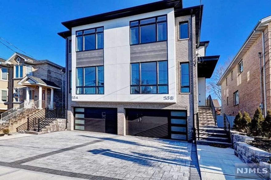 A BRAND NEW DUPLEX IN PALISADES PARK, SOUTH FACING, VERY BRIGHT AND SUNNY OVERSIZED WINDOWS, 9FT CEILINGS, LIVING ROOM WITH LINEAR GAS FIREPLACE, EUROPEAN KITCHEN WITH CUSTOM CABINETRY, LARGE QUARTZ COUNTERTOPS AND BACKSPLASH, EAT IN KITCHEN /DINING AREA, POWDER ROOM, DECK,2ND FLOOR PRIMARY SUITE WITH FBTH, 2 LARGE BEDROOMS, FULL BATH.GROUND LEVEL FAMILY /PLAYROOM, OFFICE/BEDROOM, FULL BATH, AND SIDE DOOR ENTRANCE. A CUSTOM TRIM AND MOLDINGS, OAK HARDWOOD FLOORS, HIGH EFFICIENCY, 2CAR GARAGE, STEPS AWAY FROM BROAD AVE, SHOPPING, DINING, CLOSE TO NYC TRANSPORTATION AND MAJOR HIGHWAYS, NEW CUSTOM-MADE WINDOW BLINDS WILL BE INSTALLED. ******UNIT B IS ALSO AVAILABLE FOR RENT $6300.