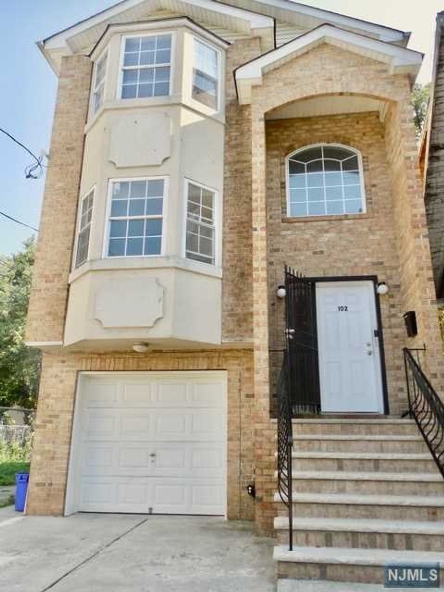 A first floor apartment of a well maintained 2 family home in the Weequahic Area of Newark. This bright sunny apartment boasts a spacious living room and dinning room area open to the newly tiled kitchen with new microwave and pantry. This apartment has been freshly painted, has newly finished wood floors with 3 large bedrooms each with large closets. The primary bedroom has two walk-in closets and ensuite. Both the main and primary bathrooms have been updated. Central heating & cooling. Laundry hook-ups available. Near major highways, shopping and parks.