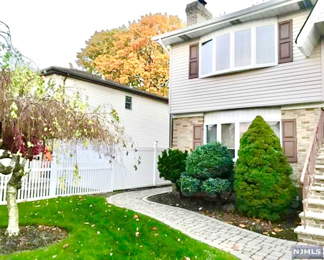 Available JANUARY 1st 2025. Ground level beautiful apartment in a two family house. Separate entrance, no stairs. Spacious rooms with open concept (kitchen/living). Recently renovated, new kitchen with granite countertop, new floors, updated bathroom. Master bedroom with king size bed w/closet. Central air and plenty of light coming through the windows only a few blocks to the Rutherford train station and or buses to New York. Exclusive use of outside patio w/extra shed. 2 assigned parking spots. No pets allowed. Laundry in a closet. Owners require a proof of income, min 700 credit score and renter's insurance.