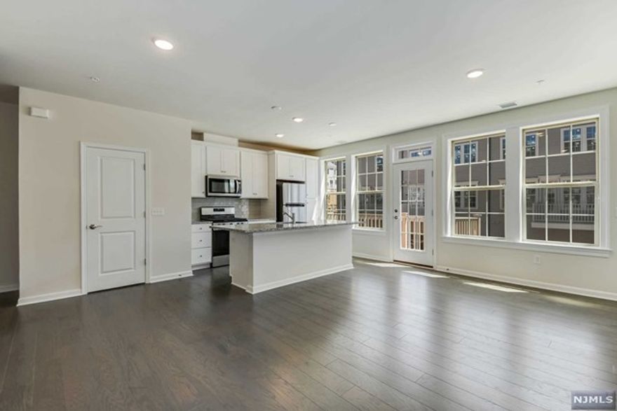 Witness a Brand New Construction Luxury Rental. Boasting 2 Bedrms 2.5 Bathrms, 1 Car Garage+ 1 Car Driveway & an Outdoor Deck,Move-In Ready Now. Brand new everything from Appliances to Floorings to Paint. Just pack your bags & move in Bergen County's most desired & sought after community. Top Elementary School, Commuter's Paradise & Easy Access to Groceries & Shopping!"ON-SITE NJ TRANSIT TRAIN STATION"& ON-SITE coffee & wine shop. Enjoy parks, children's playgrounds, tracks & fields for re-creation in the community. The inside of the home is designed to suit your modern lifestyle. Open concept layout, large windows bringing in abundance of natural light, energy efficient SS appliances, kitchen w/central island & dual temperature control thermostats. Completing the home are "TWO" LIVING ROOMS, generous sized 2 bedrooms, large walk in closets & a laundry closet. *No Pets Allowed*Available to move it today* Tenants pay-1 months realtor fee, utilities,1.5 months security deposit.