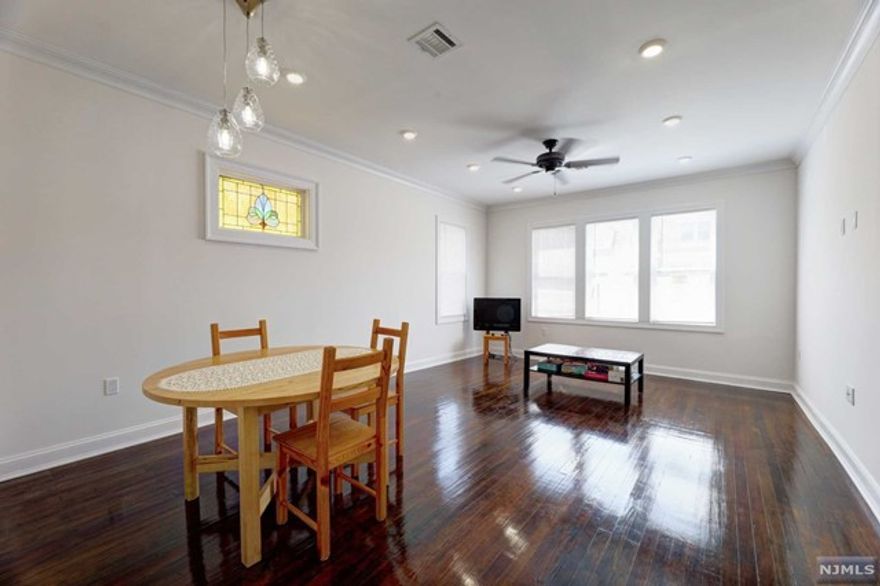 TOTALLY RENOVATED, VERY SPACIOUS 3 BEDROOM 1st FLOOR APARTMENT FEATURES NEW MODERN KITCHEN WITH SS APPLIANCES, LARGE LIVING ROOM/DINING ROOM, NEW BATH, 3 BEDROOMS ALL WITH VERY LARGE CLOSETS, CENTRAL AIR AND HEAT, WASHER AND DRYER HOOKUPS. CLOSE TO N.Y.C. TRANSPORTATION. STREET PARKING, WATER INCLUDED, TENANT PAYS ELECTRIC AND GAS. NO SMOKING UNIT. NO PETS, NO USE OF YARD. 1ST MONTH RENT, 1.5 MONTH SECURITY DEPOSIT AND 1 MONTH FEE DUE AT LEASE SIGNING. TENANT MUST CARRY RENTAL INSURANCE.