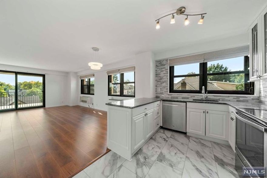 Spacious 1060 sq.ft. 1 bdrm condo converted to 2 bedroom or den/office, 1.5 baths, large balcony with seasonal NYC and Hudson River Views. Open layout apt with large living room/dining room and open concept kitchen with peninsula, granite counters, white cabinetry and stainless steel appliances, newer floors throughout, powder room and lots of closets, spacious full bath. City Windows installed for sound proofing and insulation. The Parker Imperial is a 24-hr doorman luxury building with on-site management, on-site fitness center w his/hers saunas/showers, outdoor heated pool, 24-hr garage attendant, bike storage, laundry room on every floor, free tennis/pickleball and many other sporting activities in neighboring 167 acre James Braddock Park w lake. Transporation to NYC, Hoboken and J.C. at door. Shopping and great restaurants nearby. Small pets ok. 1 assigned garage parking space, hot/cold water, pool and gym included in rent. Call Jimmy Lopez - Group Twenty Six, LLC201-741-6298