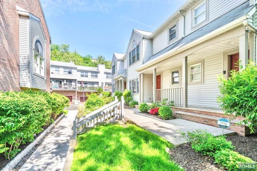 WELCOME TO MODERN ELEGANCE MEETS CHARM TOWNHOME IN QUIET PANORAMA COMPLEX LOCATED IN MOST DESIRABLE GOLDCOAST, A STEP AWAY FROM UR DOOR TO NYC BUS STOP AND FERRY, THIS "MUST SEE" UNIT HAS MANY HIGH QUALITY UPGRADES INCLUDING RENOVATED GROUND FLOOR SPACE FAMILY ROOM WITH ENTERTAINMENT W/LAUNDRY CLOSET, 1ST FLOOR COMPLETELY RENOVATED W/ CRAFTMANSHIP CROWN MOLDING, HARDWOOD FLOORS THROUGHOUT W/B FIREPLACE, OPEN LAYOUT LIVINGROOM AND DINNINGROOM FLOODED W/ LAUREL LIGHT OF DESIGNER FINISHES, ALL NEW KITCHEN W/CUSTOM BUILT SOLID MAPLE CABINETS, UPSCALE APPLIANCES, GRANITE COUNTERS, LOW VOLTAGE MOSAIC TILE BACKSPLASH, RENOVATED POWDER RM W/ PEDESTAL SINK, 2ND FLOOR HAS LARGE BRIGHT MASTER BEDROOM WITH LARGE MASTER BATH JACUZZI,WALK IN CLOSET, ALL BEDROOMS W/CUSTOM CLOSETS, LARGE GUEST BEDROOM/ HOME OFFICE AND 3RD BEDROOM/NURSERY, LARGE TWO CAR GARAGES WITH CUSTOM BUILT SHELVING AND 2 CAR OUTSIDE PARKING ON DRIVEWAY, TERRACE W/ BEAUTIFUL SUNRISE VIEW, SELLING "AS IS" DONT MISS THIS OUT