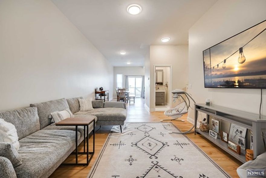 Newly renovated 2 Bedroom + 1.5 Bath + Bonus Room + Bonus Storage Room two-floor / duplex apartment with new mechanical, electrical, and plumbing. First floor features the master bedroom, living room, kitchen, and access to private backyard and deck. Bottom floor includes second bedroom, a bonus room, a storage room, washer & dryer, and a half bath. One parking spot included and private backyard with brand new deck. Modern kitchen and bathroom fixtures and appliances, new flooring, new windows, and new heating system. Also, newly paved sidewalks and streets due to Union City Beautification Project. Easy commute to NYC (10 minutes drive, bus stop 3 blocks away) and convenient access to Hoboken, Weehawken, and Jersey City. Be the first to live in this bright apartment in a friendly, quiet tree-lined neighborhood! This neighborhood has been rated 94 out of 100 Walk Score with lots of shops and restaurant options. Schedule your private tour now before this is gone!