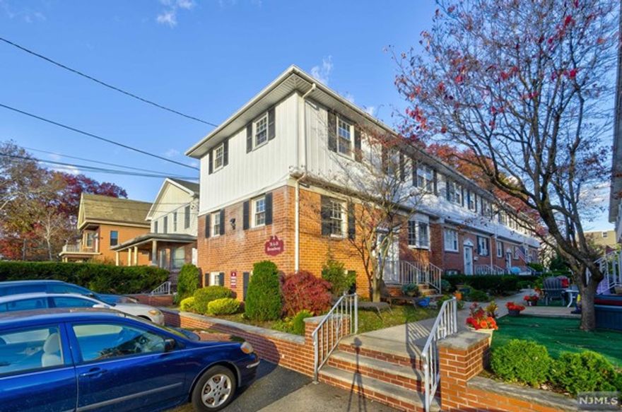 Sunny, oversized townhome style end-unit condo in the beautiful Bergen Point section of Bayonne! Hardwood floors throughout this 3 level, 4 bedroom, 3 and 1/2 bathroom home. Kitchen updated 5 years ago. Move right in! Roof was replaced 7 years ago. Water heater is 1 year old. Master bedroom with en-suite. Family room in full finished Basement. 2 laundry stations - 1 stackable unit in basement, and 1 stackable unit in kitchen. Community backyard, delightful garden in front yard!